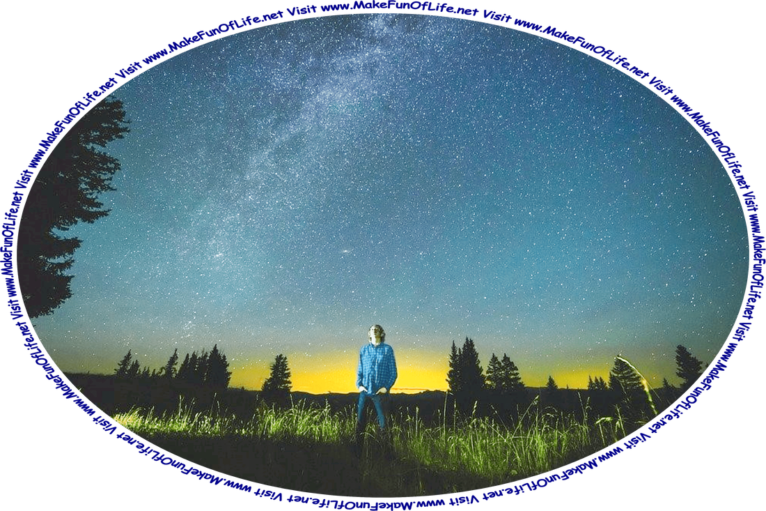Picture of a young man standing in a field of tall green grass and looking up at the stars.