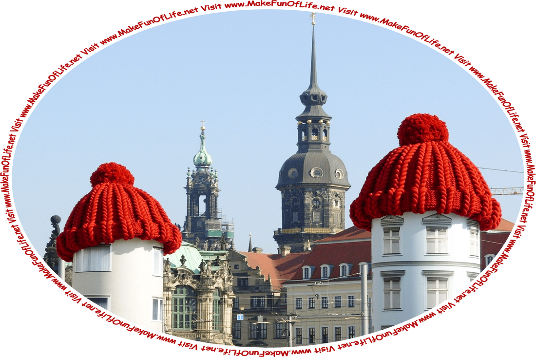 Picture of a 2 round tower-like buildings with extremely large dark red woven watch caps atop them, and the words, ‘Visit www.MakeFunOfLife.net.’