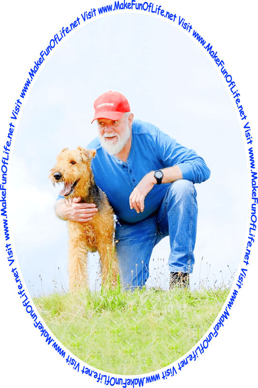 Picture of a man taking a knee next to an Airedale dog at the top of a green grassy hill, with bluish-white clouds in the background, and the words, ‘Visit www.MakeFunOfLife.net.’
